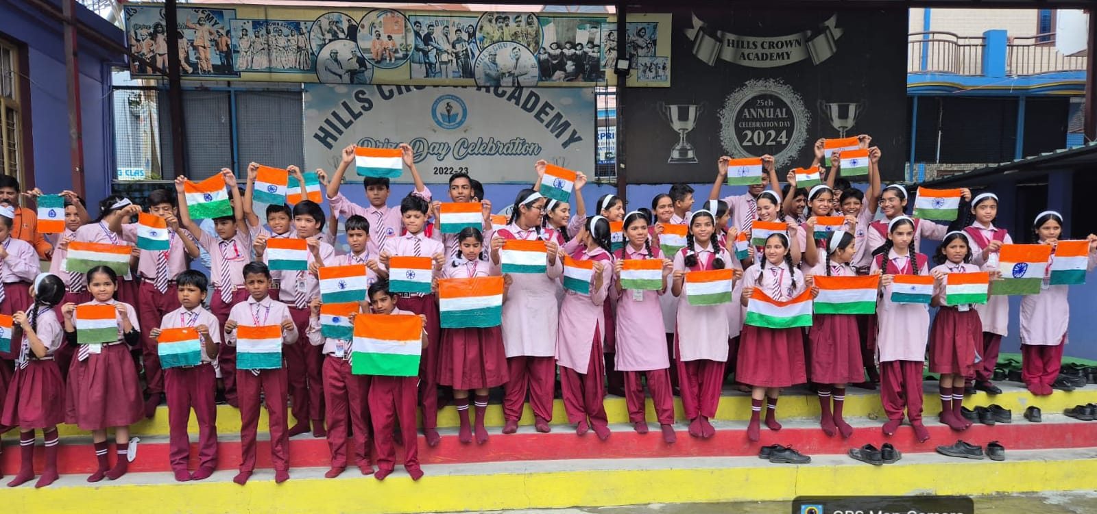 Students holding Indian flags in Dehradun